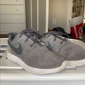 grey Nike shoes